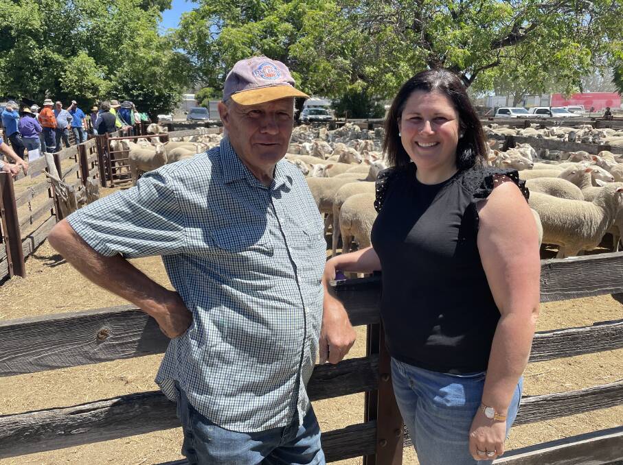Barry Morris and Kylie White, Winton, sold about 500 Border Leicester/Merino-cross ewes at Benalla's special sheep sale on Friday. Picture by Rachel Simmonds