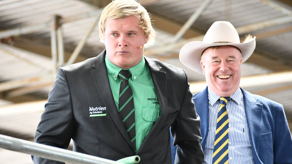 RECOGNISED: ALPA Young Auctioneer Competition winner Jack Ginnane in front of Australian Livestock & Property Agents chief executive Peter Baldwin.