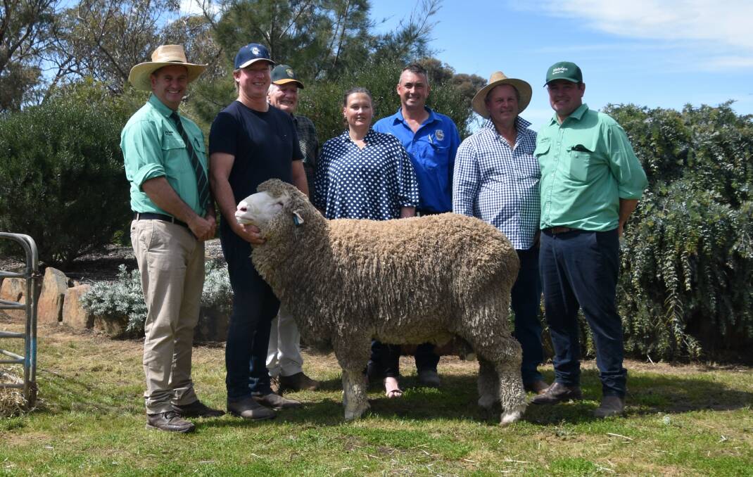 Victoria's dearest ram for 2022 which sold for $80,000 with Rick Power, Nutrien, Daniel and Philip Gooding, Tarin Rock, WA, Karina, Tim and Roger Polkinghorne, Banavie/Charinga, and Mitch Crosbie, Nutrien.