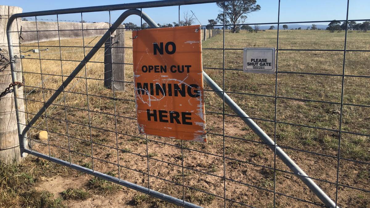 PROTEST: Landowners across the district displayed similar signs on their gates opposing the project.