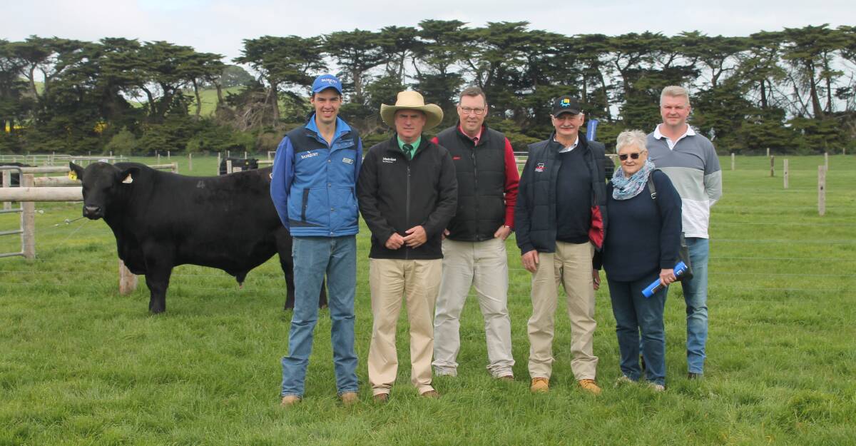 Banquet Angus co-principal Hamish Branson, Mortlake, Nutrien south-east stud stock manager Peter Godbolt, Elders Victoria and Riverina stud stock manager Ross Milne, and purchasers of the top-priced bull David, Vivienne and Damon Young, Londavra Angus stud, Saint Marys, Tas, with which sold for $42,000. Picture by Philippe Perez