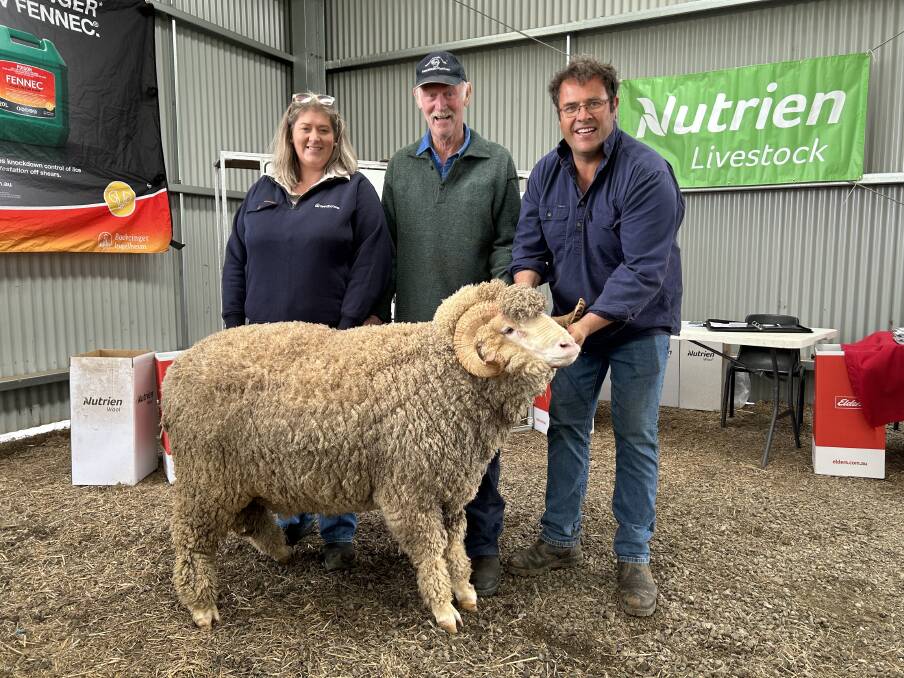 Catherine Lamaro and Duncan Campbell, Barwonleigh Agriculture, Inverleigh, with the $12,500 Wurrook Merinos ram they purchased and Wurrook stud principal Paul Walton, Rokewood.