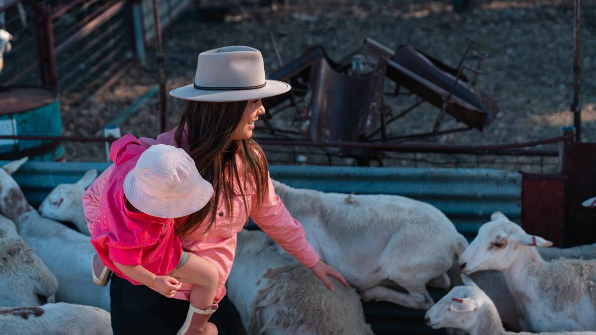 Child wrangler and farmer Sophie Cameron with her daughter Ellena at their Timor farm near Maryborough.