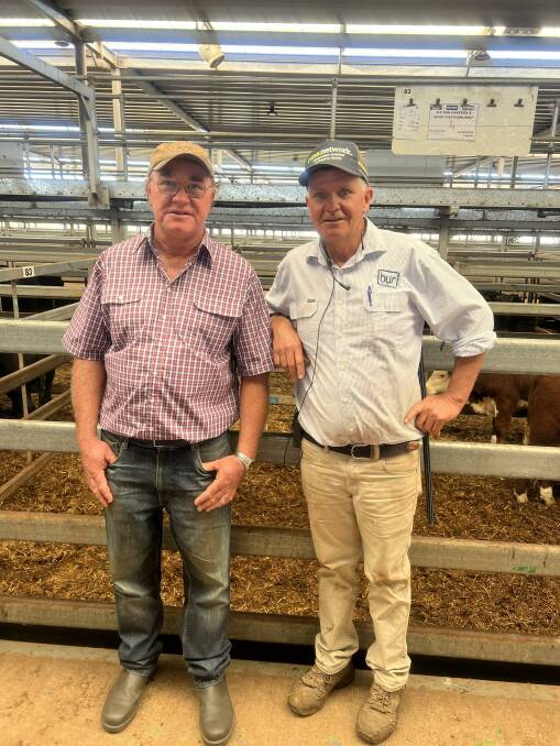 VENDOR: Don Cameron, Bowna, NSW, sold 20 Hereford steers, 330kg, for $2250 or or 681 cents a kilogram. Pictured with Brian Unthank Rural director Michael Unthank.