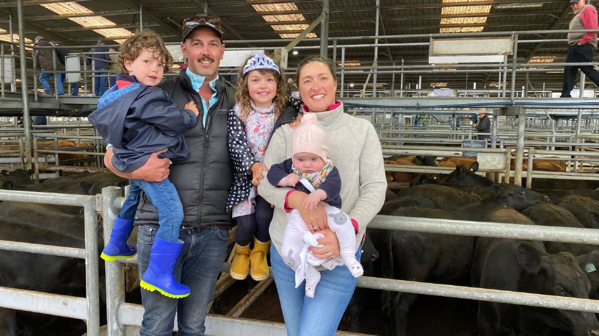 FAMILY: Dave and Ellie Caldwell, with kids Chas, 2, Bel, 4, and Prim, six months, Coonmoor Pastoral Co, Lindenow South, sold Angus steers, 14-15 months, to $2770 at Bairnsdale on Friday.