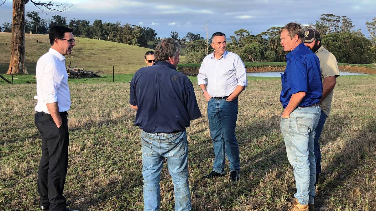 Agriculture Minister David Littleproud and Gippsland MP Darren Chester in Gippsland with local farmers.