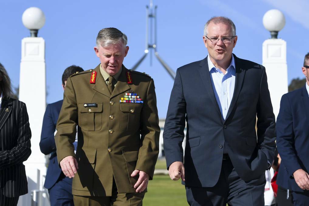 Coordinator-General for Drought, Major General Stephen Day and Prime Minister Scott Morrison arriving at the National Drought Summit at Old Parliament House in Canberra today. Photo by Lukas Coch.