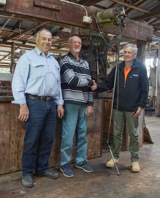 Locals: John Drife, Tony Hill and Alan Baird on the stand where Bushy shore his very first sheep.