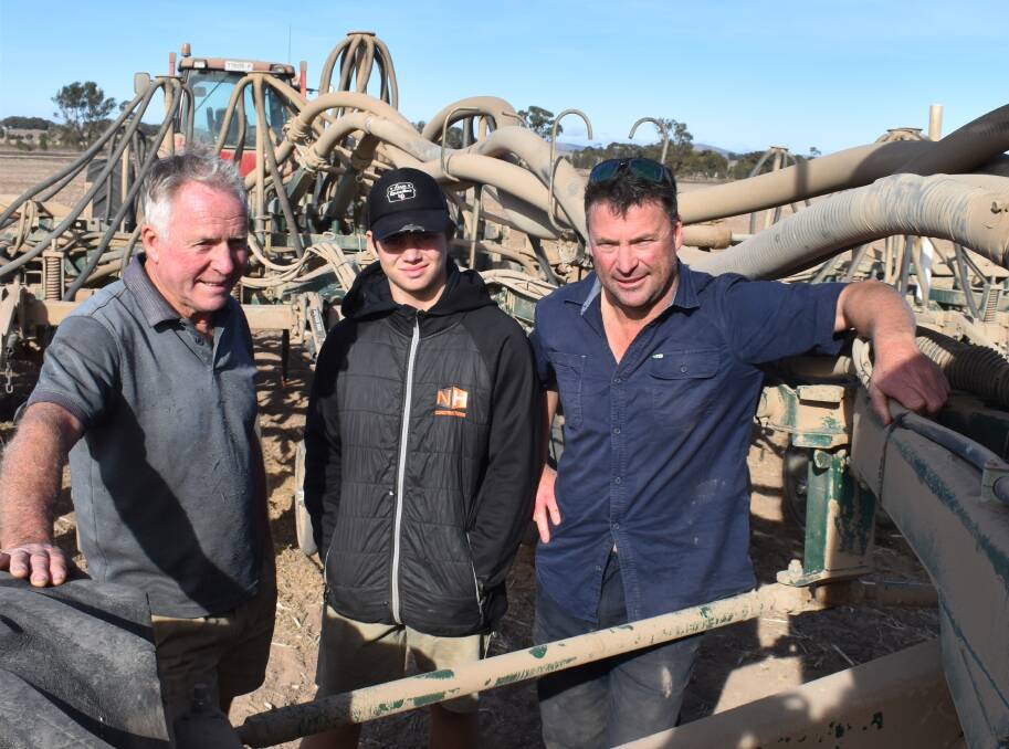 THREE GENERATIONS: Chris Bibby, grandson Jaxon, and son Shane, Navarre, started sowing on April 8 and are well into a cropping program of 2100 hectares.