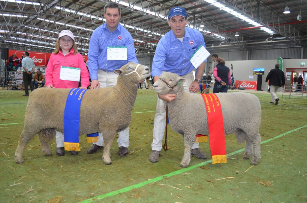 Southdown: Hannah and Chris Badcock, Fairbank, Hagley, Tas, with the champion ram and Andrew Sellars-Jones, Chandpara, Tylden, with the reserve.