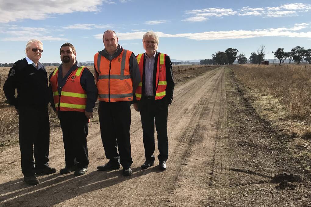 Goldfields group officer Robert Ipsen (representing CFA), with Central Goldfield Shire works supervisor Trevor Young, operations manager Glenn Deaker and chief administrator Noel Harvey, inspecting a new fire access road.
