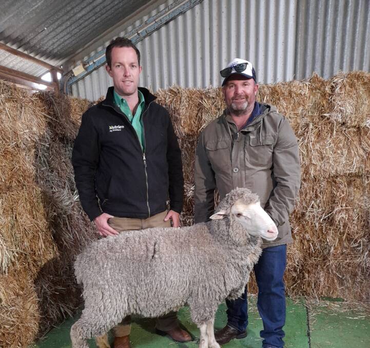 TOP RAM: The top priced ram at $11,000 top priced ram sold to Dean and Denise Trotter, Perillup Estate Mt Barker, WA, with Daniel Gifford Nutrien, St Arnaud, and Glendemar MPM principal Ben Duxson.