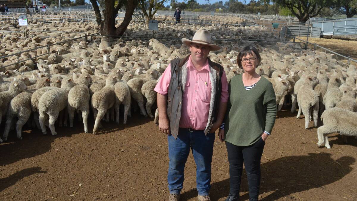 Lambs: Jason Telford, Elders, Barham, with Jo Bear, Loddfon Vale, representing Bright Future and some of their draft of around 1000 Border Leicester/Merino cross wether lambs at Wycheproof.