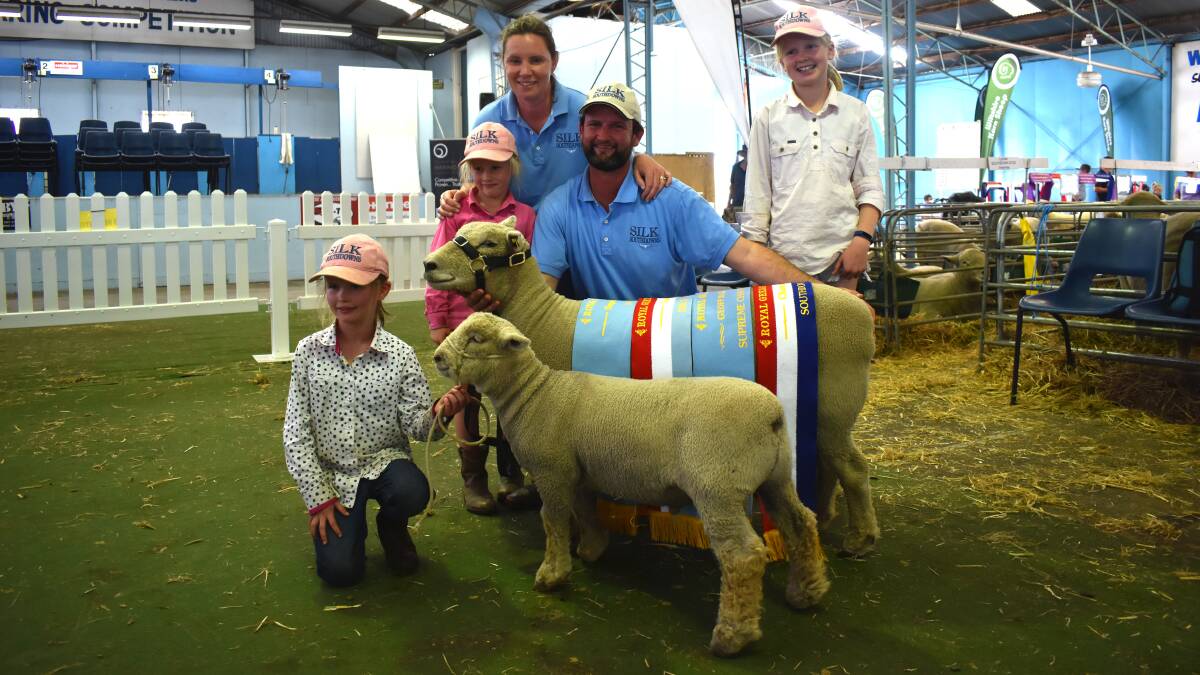 Supreme of show: Breeders of the Supreme Champion Sheep of the Show Kate and Simon Thomas with their children Lexi, Imogen and Emma.