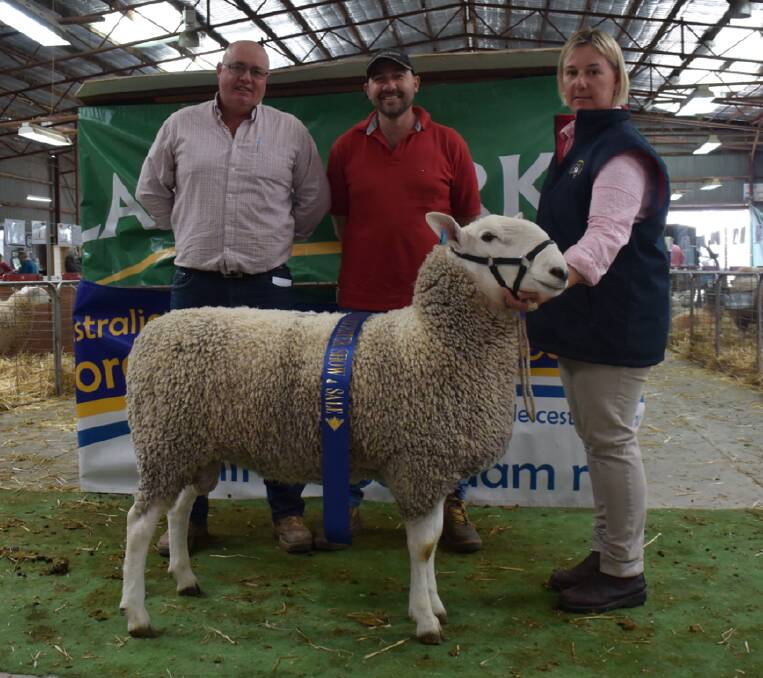 Scott and Emily Davidson, Morton Border Leicesters, Lucindale, SA, and buyer Martin Harvey, Paxton stud, Bordertown, SA, with the presale champion ram and second top price at $10,000.