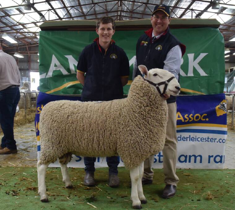 Will Schilling, Glenlee Park, Glenlee, and Jeff Sutton, Wattle Farms, Temora, NSW, with the top priced ram which sold for $11,000.