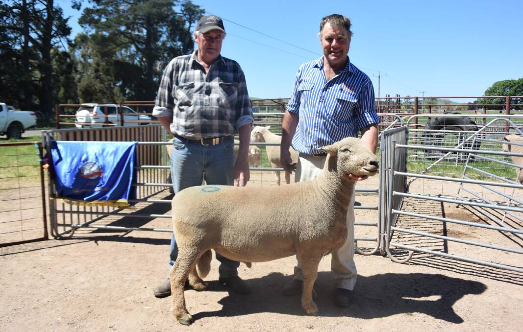 Equal Top priced Southdown Ram purchaser Rod Knight with Yentrac Principal Rob McCartney.