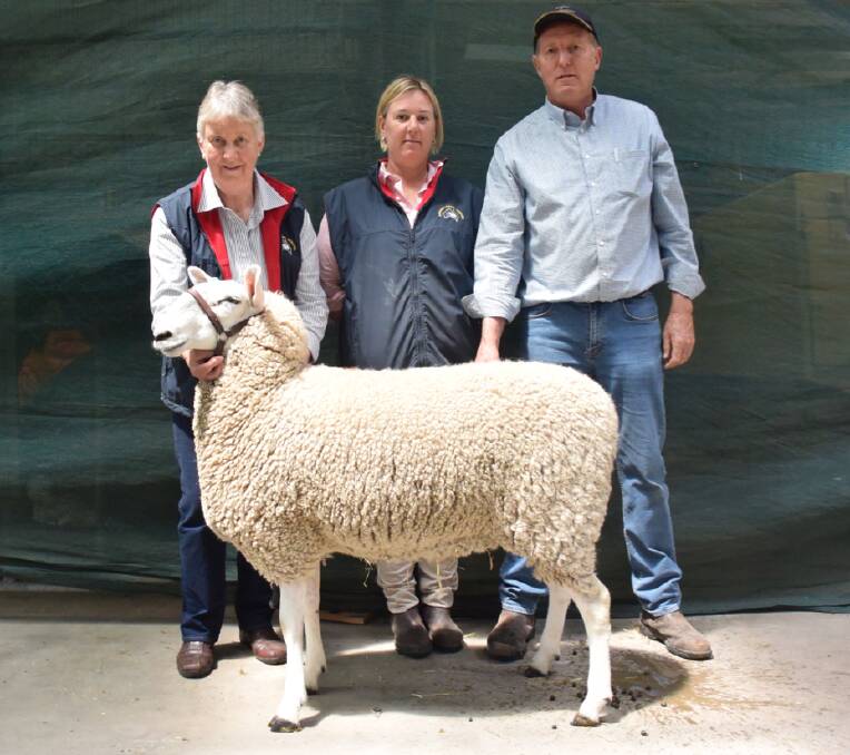 Heather Stoney, Ellengerin, Inverleigh, Emily Davidson, Morton, Lucindale, and Harold Manton, Robe, SA, with the top priced ewe which sold for $1200. 