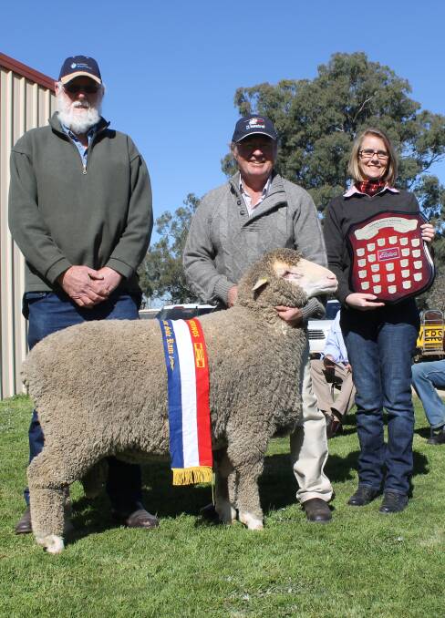 Ken Heal, Wirrate stud, Nagambie, was awarded the champion ram title in 2014. He is pictured here with 2014 judge Stefan Spiker, Hamilton, and Jenni O'Sullivan, Elders.