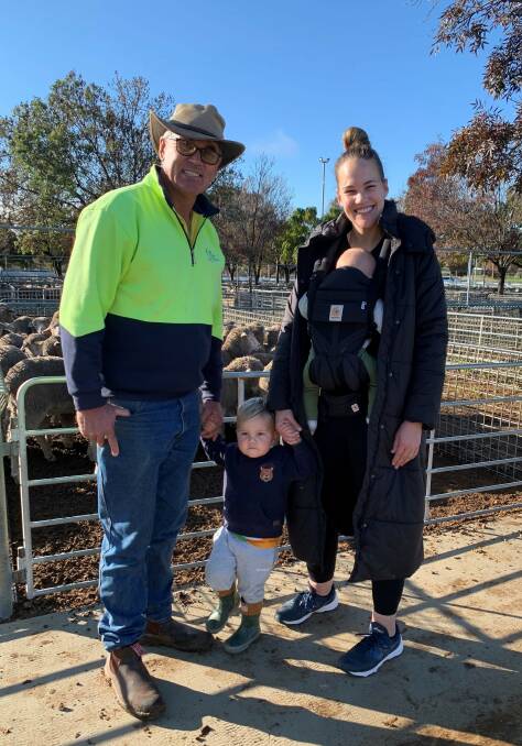 FUN DAY OUT: Gary Manley with George, Chelsea and Archie Jeffries, Ouyen, at Ouyen's recent lamb sale.