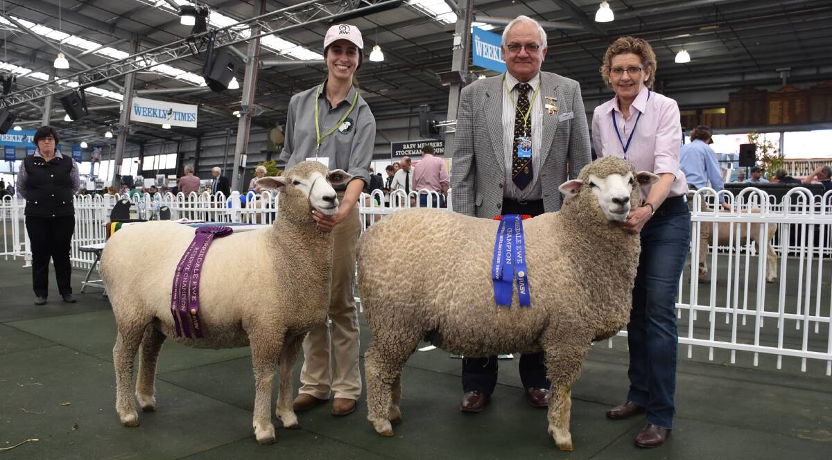 Bridget Leahy, with Sweetfield's reserve champion ewe, and judge Ian Staritt and Bron Ellis with the champion ewe.