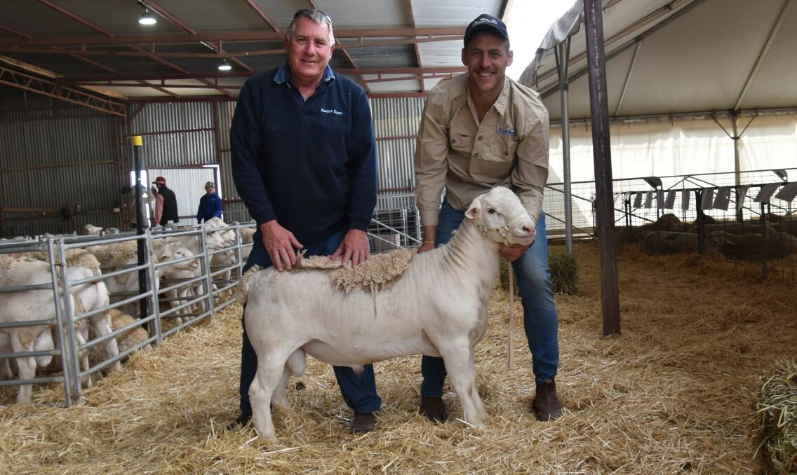 With the top-priced UltraWhite ram at $10,000 were buyer Steve Funke, Bundara Downs stud, Western Flat, SA, and Anden principal Joel Donnon. Picture by Alastair Dowie