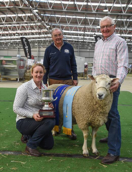 Mount Monmot Perendales took out the Dick Clayton Perpetual Trophy for Perendale supreme champion. The ribbon winning ram is with Mount Monmot's Trudy Boyer and Malcolm Fletcher.
