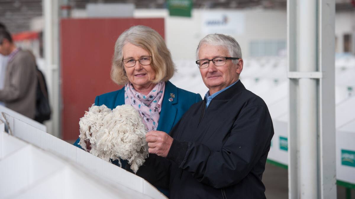 St Helens woolgrowers Sue and David Rowbottom, Rowensville Ultrafine Merino stud, at the Melbourne woolstores, with some of their wool. Photo by Laura Ferguson.