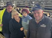 FAMILY: Marty, Lou, Ted, 4, and Marty Gleeson, Carrahil, Clarendon, sold 26 Angus steers, 381kg, for $2540 or 661c/kg.