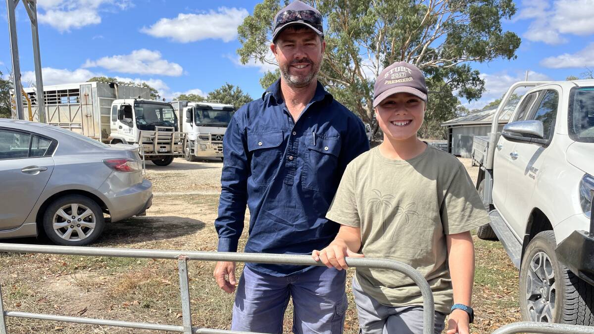 SOLID PRICES: Shawn Klose, Cambrai, SA, and son Calum, 12, sold six lambs for $200 at Mount Pleasant, SA, last week.