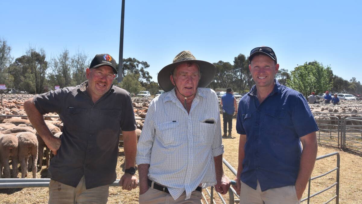 Lee Crane and Robert Selkrig, Mildura, with Matt Kelly, Werrimull, who bought 400 ewes from RJ&BJ Edwards at the Yelta market last week. Picture by Liam Wormald