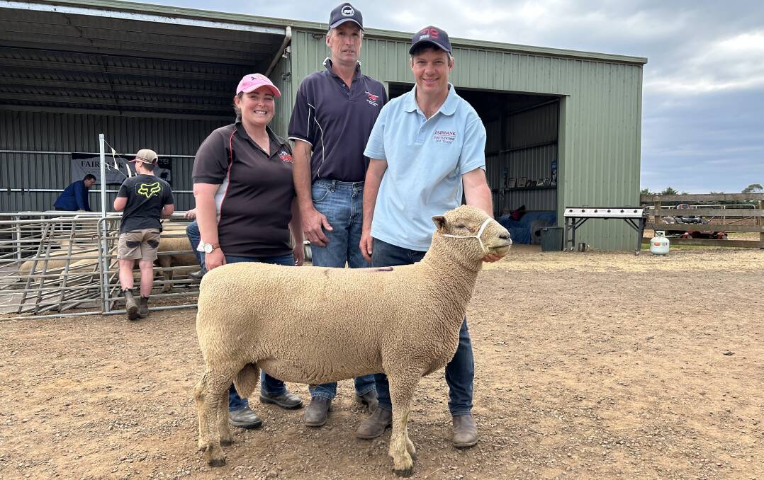 Aneika Crosswell and Andrew Hogarth, Kirkdale Southdowns, Evandale, Tas, with Fairbank stud principal Chris Badcock and the record-priced ram.