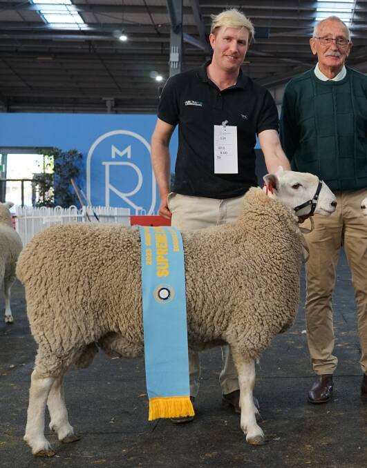 Aurora Park Border Leicester stud principal Matthew Hill, St Helens Plains, and Border Leicester judge Australian Sheep Breeders Association president Peter Baker, Baringhup, with the supreme Border Leicester exhibit. Picture by Rachel Simmonds