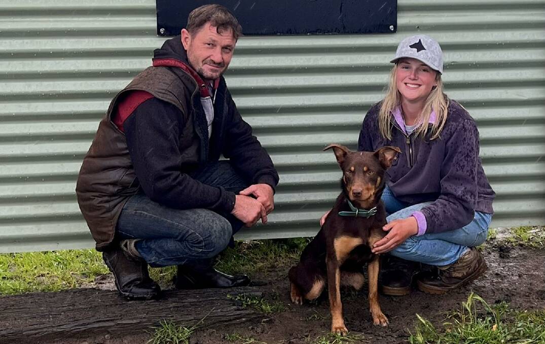 Joe Spicer and Lara Herrmann, GoGetta Kelpie stud, Glenthompson, with the top-priced dog of the sale GoGetta Trunk (also known as Mouse), who made $28,000. Picture supplied.