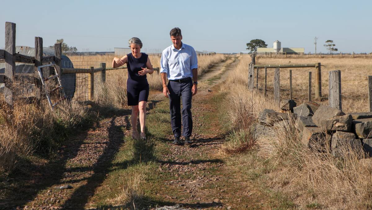 THE LONG ROAD: The Sisters dairy farmer Jill Porter speaks with Federal Energy Minister Angus Taylor. Photo by Rob Gunstone.
