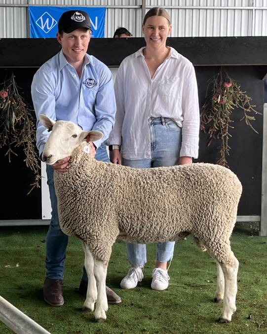 Will Schilling and Billie Barber, Glenlee Park Border Leicester stud, Gerang Gerung, with the ram that topped their sale at $5000. Picture supplied