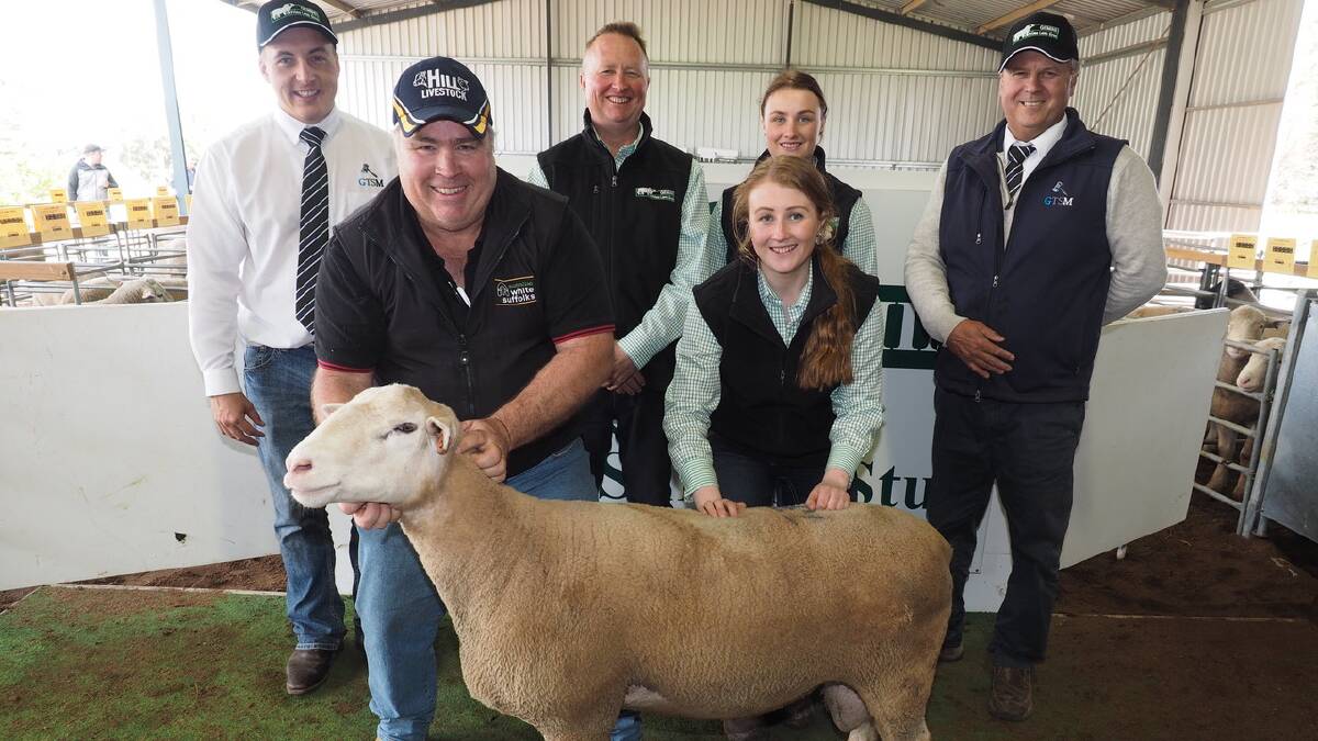 Lincoln McKinlay, GTSM, Anthony Ferguson, Anna Villa White Suffolk stud, Weetulta, SA, Craig, Emily and Chloe Mitchell, and Michael Glasser, GTSM, with the top-priced ram of the day.
