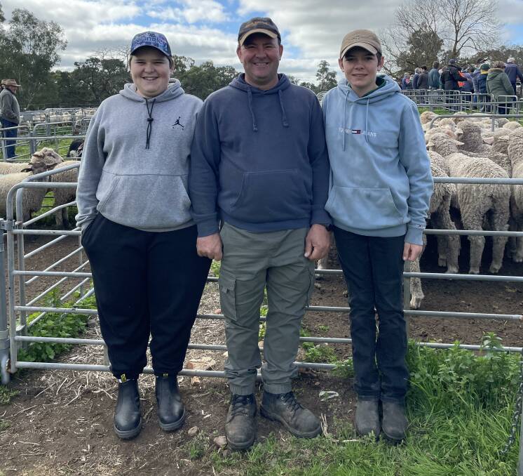 FAMILY TRIP: Logan, Dale and Hudson Waechter, Moculta, SA, at the recent Mount Pleasant, SA, sheep market.
