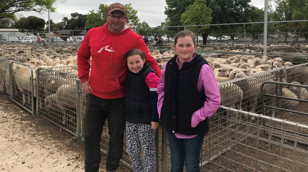 FAMILY ATTENDANCE: Scott, Ruby and Bridie Clarke, Ouyen, at last fortnight's sheep sale at Ouyen.