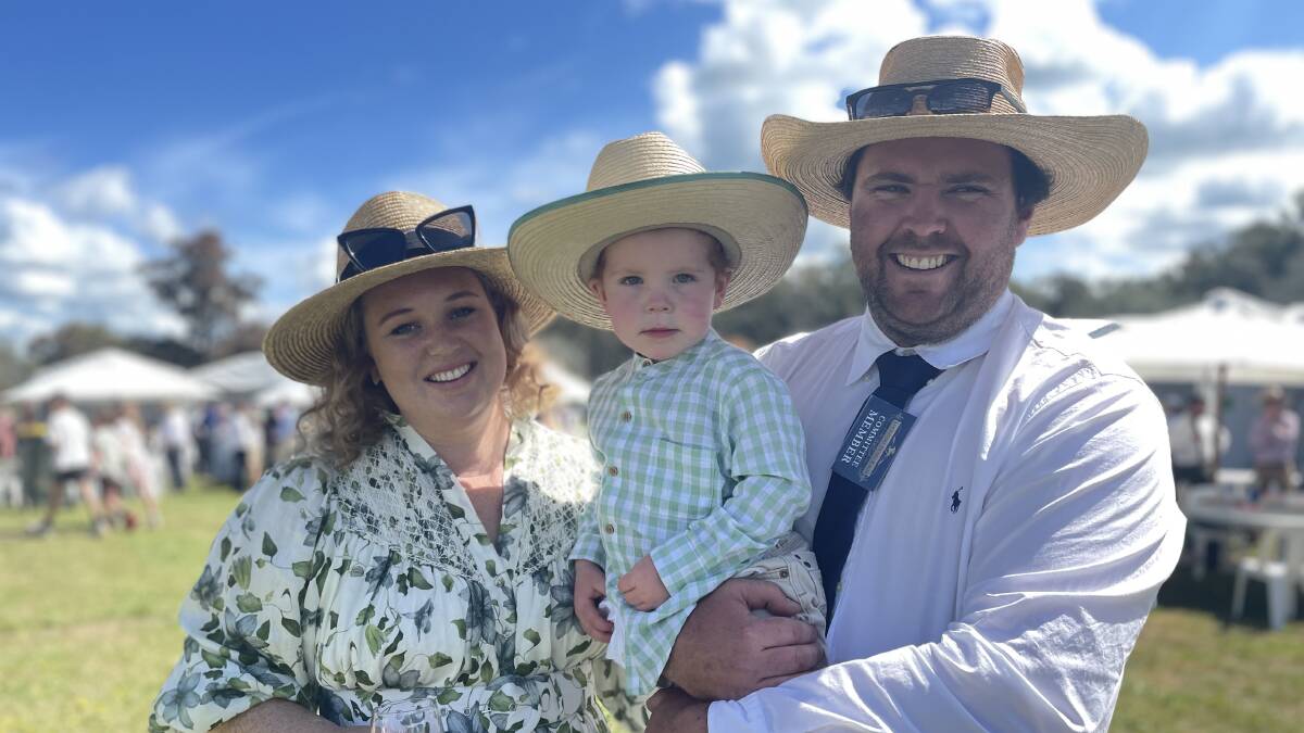 Annie and Will Lane, pictured with their son Harry, 3, at the Lockhart Picnic Races. Picture by Monty Jacka