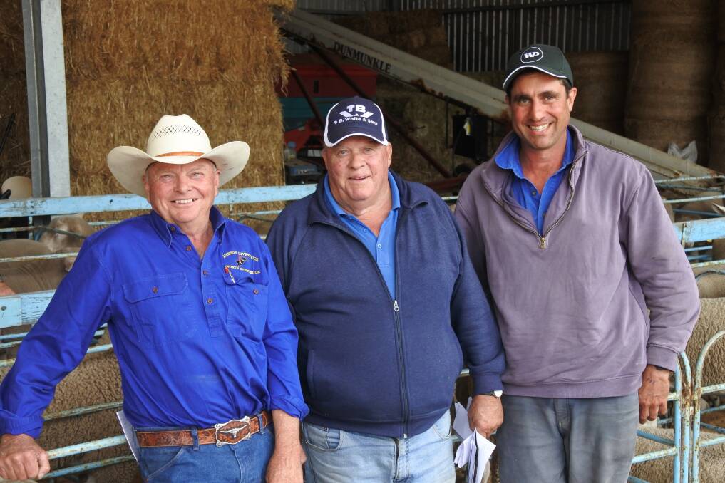 VOLUME BUYER: Jackson Farming stud principal David Jackson, with Geoff White, TB White & Sons, Ballarat, and Wes Stott from Burgess Rural, Holbrook, NSW. 