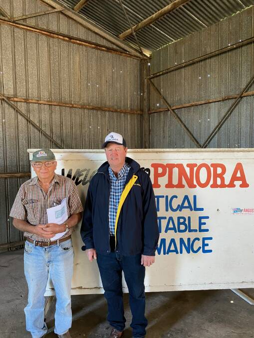 PINORA: Buyer of Pinora Angus' top-priced bull Gavin Missen, Woodside, with Pinora stud principal John Sundermann.