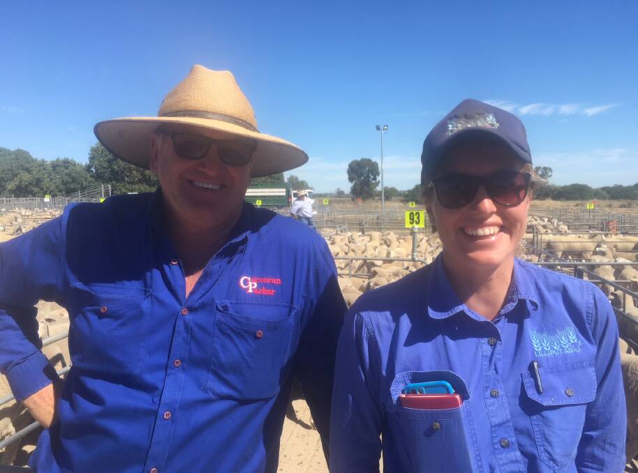 TO MARKET:  Clynton Rixon from Corcoran Parker Corowa with Caitlyn Hiskins of Lilliput Ag Rutherglen, who sold aged ewes at Corowa. Lamb numbers there lifted and quality improved on Monday. 