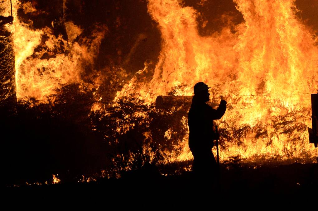 BLAZE: Firefighters tackle the Benloch Fire in 2019. Photo by Darren Howe.