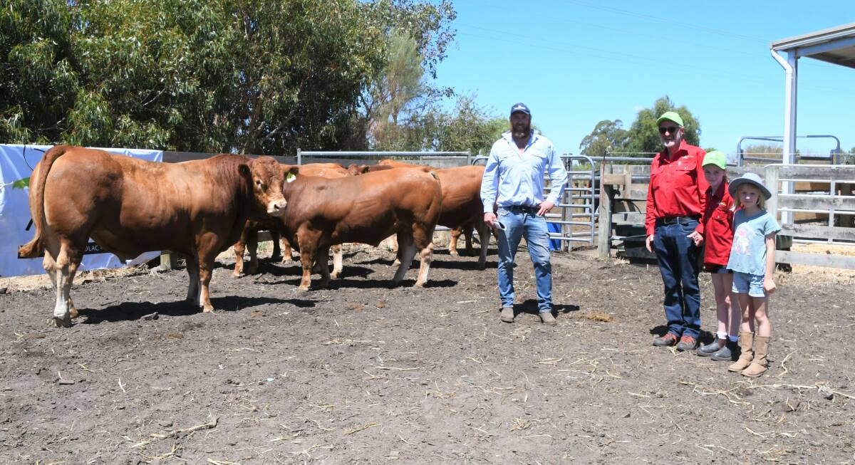 Top-priced bull offered by Pelican Rise Limousin with purchaser Joe Dare, Dare Frost Partnership, Colac, stud principal Chris Meade, and granddaughters Zhara and Molly Meade.