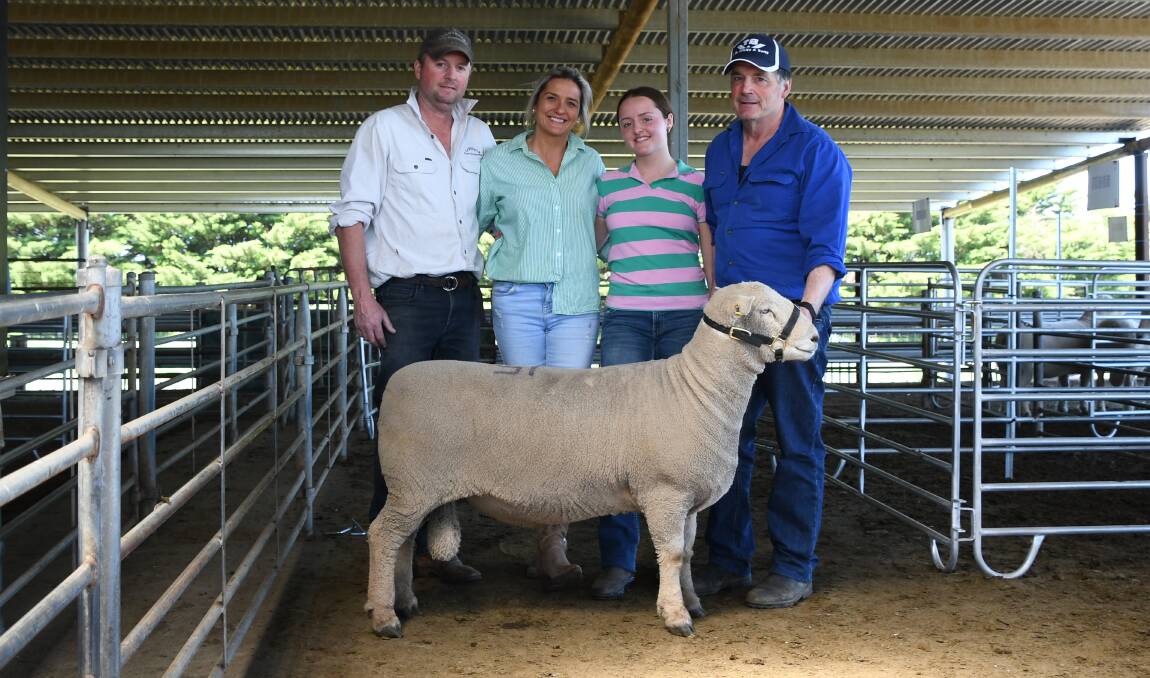 STUD SIRE: Lansdale Pure Southdown principals James, Janie and Arabella Knight, Bamganie, with Graeme Dehnert, Fernhill Southdowns, Ballan, and his new stud sire.