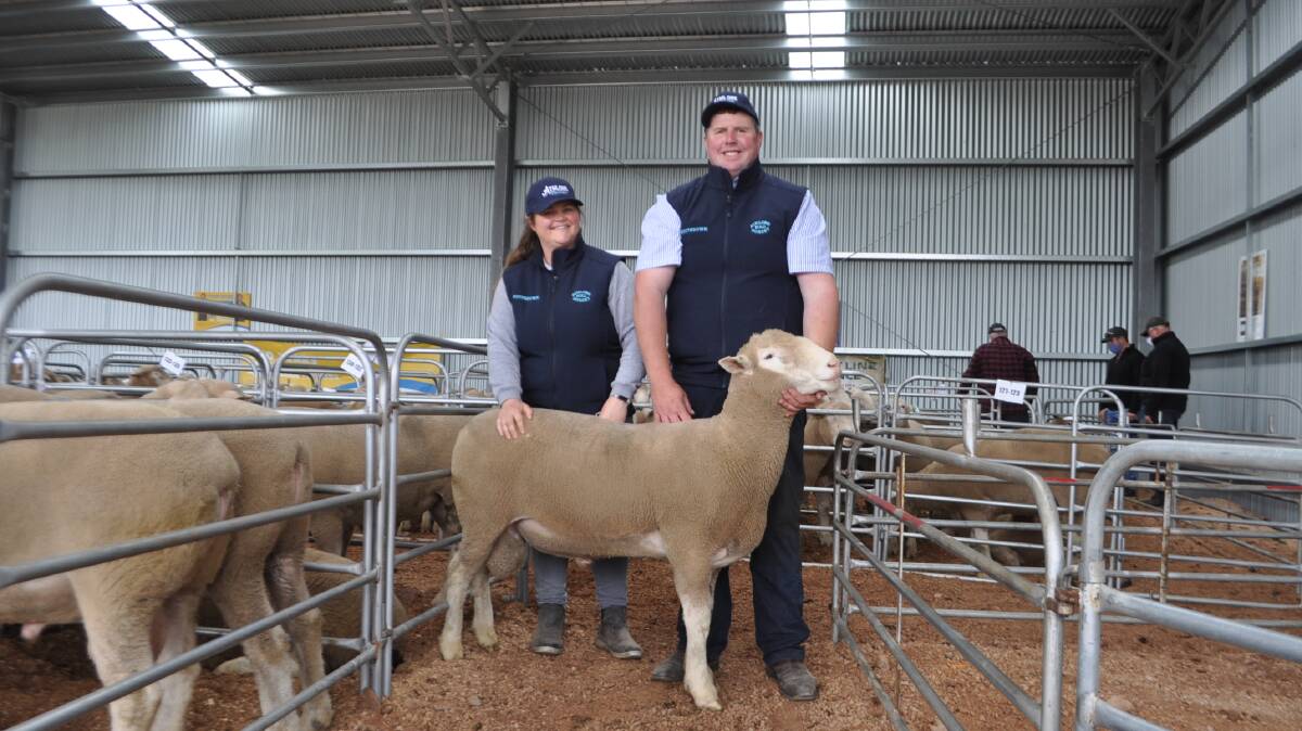TOP BUY: Lucy and Damian Cameron, Athlone Stud, Penshurst, with the top price Poll Dorset Ram, which sold for $2800. It was bought by P & M Munn, Woorndoo.