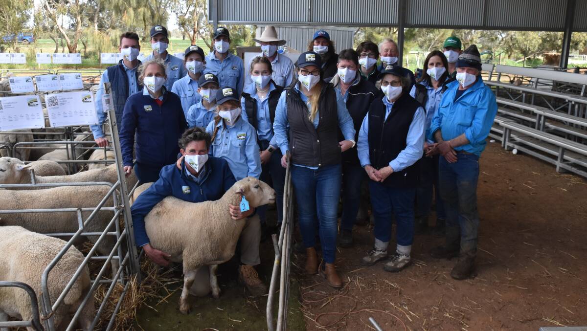 DREAM TEAM: The Cloven Hills team with the top-priced ram - Lot 3, CH202389 - which sold for $11,200 to Yarram Park Composites, Willaura, in a sale that recorded a total clearance of 492 rams.