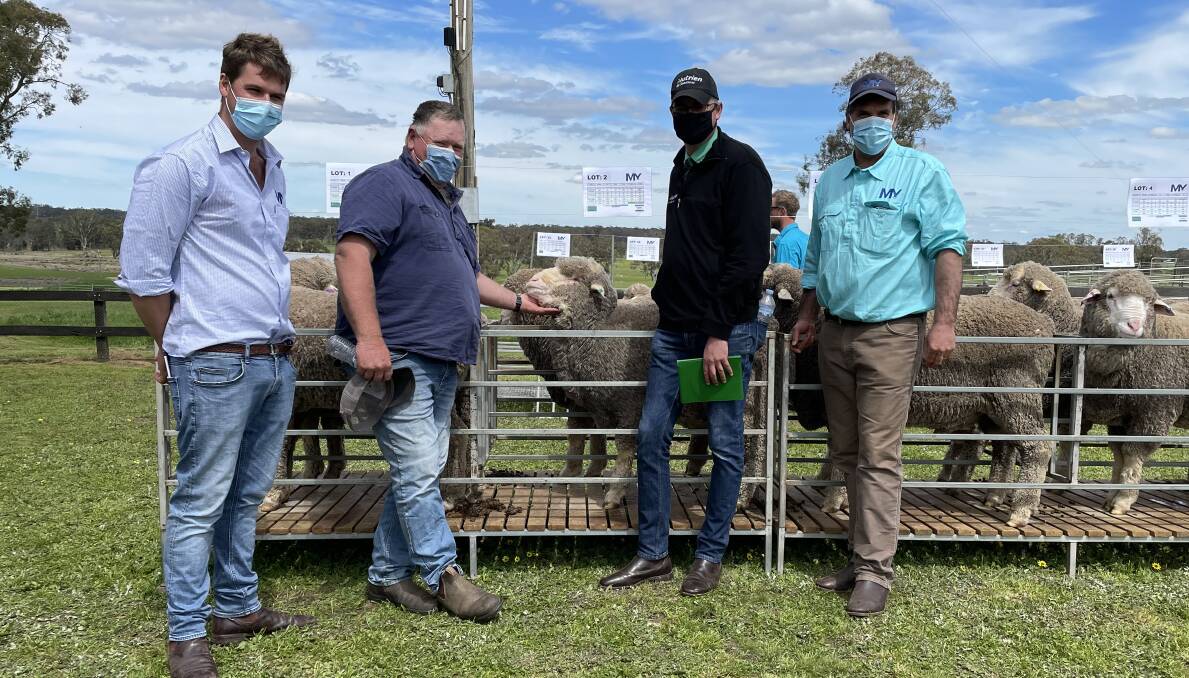 VOLUME BUYER: Daniel Rogers, Mount Yulong, volume buyer Neville Robinson, Charam, Nutrien agent Roly Coutts, and Peter Rogers, Mount Yulong, with Lot 2.