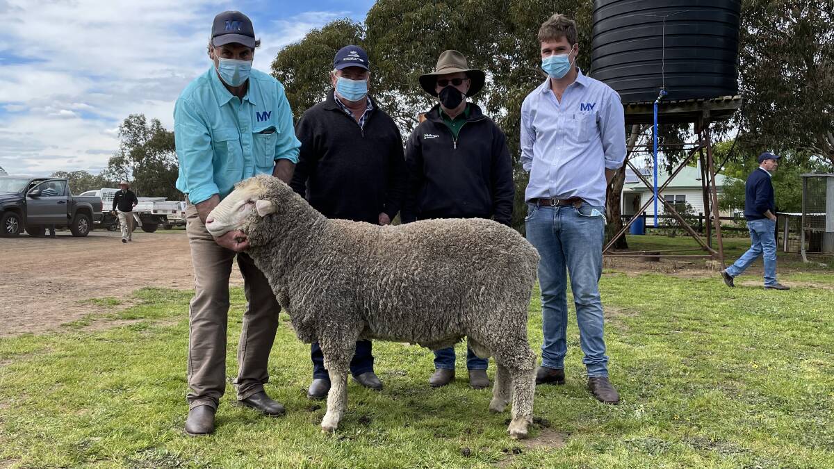 TOP RAM: Mount Yulong stud principal Peter Rogers, top-priced purchaser Peter Remfrey, Stavely, Nutrien Wool agent John McGarth, and Daniel Rodgers, Mount Yulong, with Lot 9.